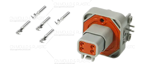 Moulage par insert de pièces estampées